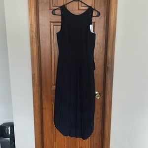 Brand new!  Beautiful fully lined navy blue BR dress - bias cut on the hem